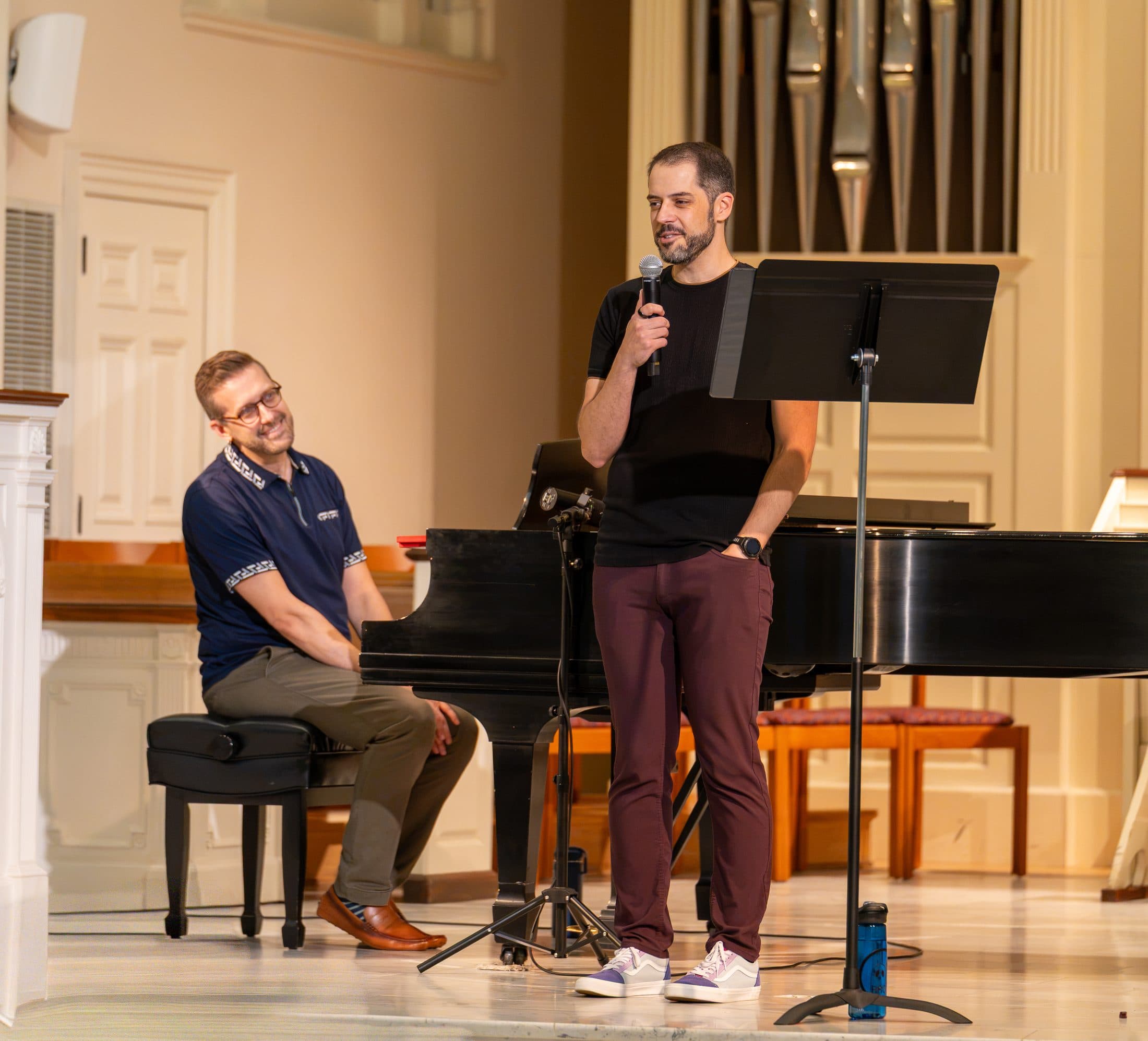 A performer speaking to the audience between songs